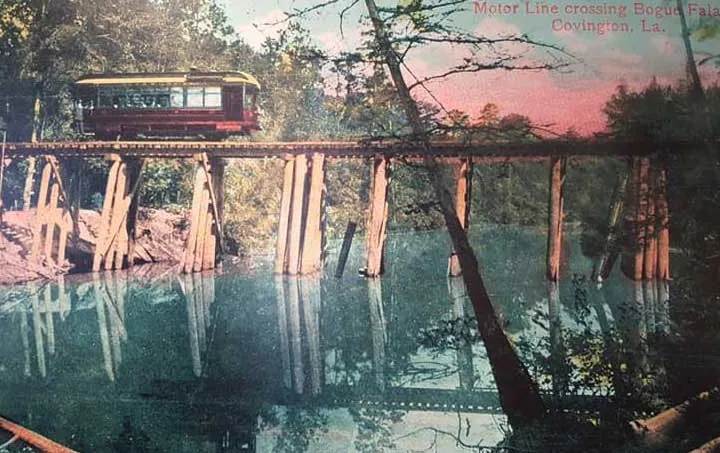 Until 1911: A motorcar crossing the Bogue Falaya at Pitcher Beach, upriver from the Railroad and Boston Street bridges. First diesel, then electric.
